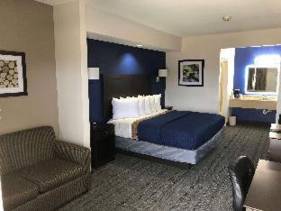 Executive Inn And Suites Joaquin Room photo